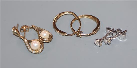 Three pairs of earrings including a solitaire diamond pair and two 9ct gold and gem set earrings.